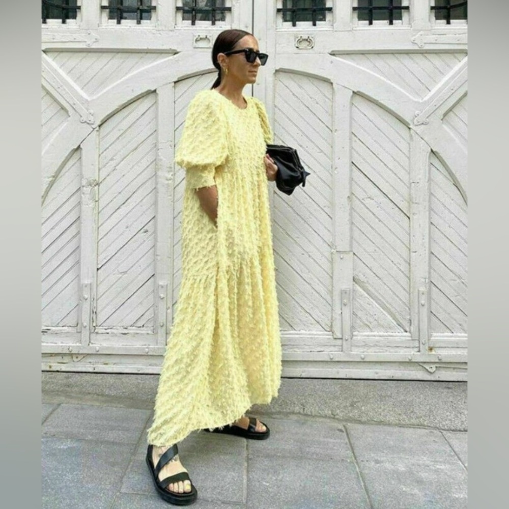 Voluminous textured pale yellow dress